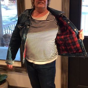 Reversible distressed jean jacket.